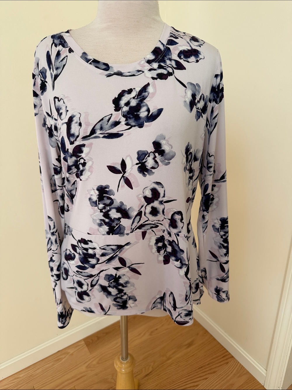 Ivanka Trump large floral peplum top.